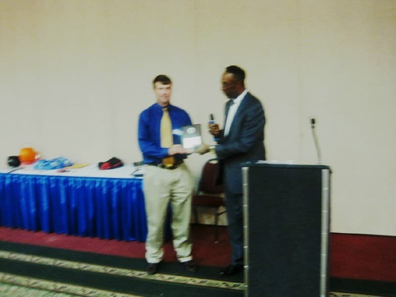 Andrew Johnson presents an award